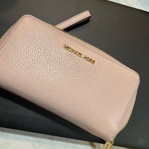 Pink Michael Kors iPhone wristlet wallet